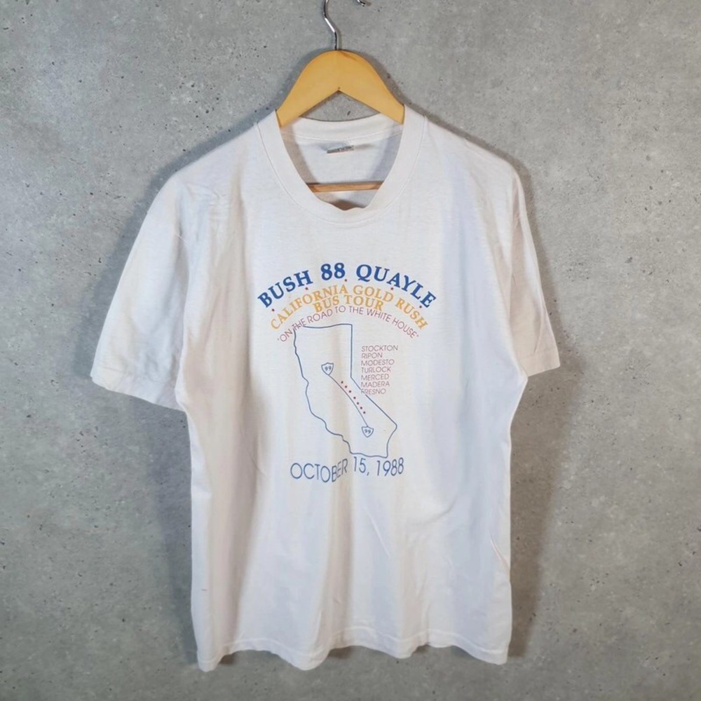 White Graphic Tee with Blue and Gold Print